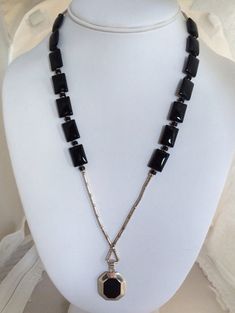 "Free Shipping on orders over $35.00 however if there is a return buyer to refund seller for the free shipping cost to seller. Black Jet Dome Rectangular Onyx Bead Sterling Silver 925 Station Necklace Unique Designer Bracelet Stunning Design Shiny Black Stones Measures - 21\" + Dangle Pendant - 1.17\" x 0.83\" or 20.85mm x 29.60mm Marked 925 = Sterling SilverFree Shipping on orders over $35.00 however if there is a return buyer to refund seller for the free shipping cost to seller. Free Shipping Black Handmade Necklace With Rectangular Pendant, Rectangular Black Beads Jewelry Gift, Rectangular Black Beads Jewelry As Gift, Rectangular Black Beaded Jewelry Gift, Elegant Rectangular Polished Beads Jewelry, Handmade Black Jewelry With Square Pendant, Black Jet, Designer Bracelet, Black Stones