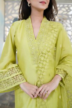 Trendia brings you Lace work Lime Green Kurta and pants set by the brand Label Shaurya Sanadhya. This Kurta set comes with a Mandarin v-neck collar in sequin detailing and lime green dupatta with lacework, thread work and sequinned all over it. This suit set for women is the perfect pick for any occasion. The Kurta includes full bell-sleeves with net sequin and lace detailing. The Kurti is designed in straight cut hem and is at calf length. Find out the photos of the product for a more detailed Full Sleeve Kurta Set Women, V Neck Suit Design Pakistani, Kurti With Net Sleeves, Net Suits Design Indian Straight, V Neck Kurta Set, V Neck Pakistani Suit Design, Bell Sleeves Suit Design, Pakistani Collar Kurti, Neck Designs For Net Kurtis