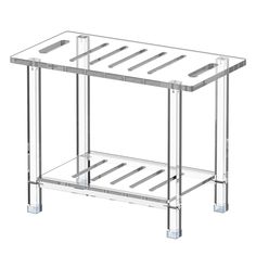 a clear glass and metal side table with two shelves on each side, one shelf is open