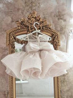 Looking for the perfect outfit for your little princess's special occasion? Look no further than our stunning Tutu Baby Girl Birthday Outfit! This beautiful infant party dress features a short and puffy design, complete with delicate pearls and a glittery gold tutu skirt. Perfect for flower girls, birthdays, and other special occasions, this dress is sure to make your little girl feel like a true princess. Made with high-quality materials, this toddler dress is not only beautiful but also comfor Flower Girl Toddler, Dress With Pearls, Gold Tutu, Baby Birthday Dress, Baby Party Dress, First Birthday Dresses, Toddler Flower Girl Dresses, Infant Flower Girl Dress