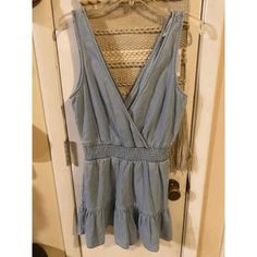 American Eagle Romper. Light Jean (Light Weight And Light In Color) Pockets, Elastic Waist And Clasp At Bust. Adorable Ruffle At Bottom. 100% Cotton. Nice Summertime Outfit With A Tank Or Swimsuit Underneath. Nwt Size Small. Smoke Free Home. Happy To Offer Bundle Discounts Too! Casual Overall Dress For Vacation, Spring Blue Overall Dress, Denim Jumpsuits And Rompers For Beach In Spring, Sleeveless Light Wash Jumpsuits And Rompers For Summer, Summer Sleeveless Light Wash Jumpsuits And Rompers, Spring Beach Denim Jumpsuits And Rompers, Sleeveless Light Wash Summer Jumpsuits And Rompers, Light Blue Casual Jumpsuits And Rompers For Spring, Casual Light Blue Jumpsuits And Rompers For Spring