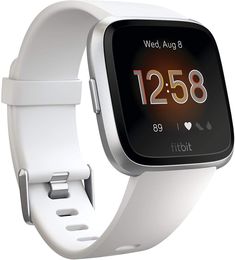 the fitbit smart watch is white and has a heart rate monitor on its display