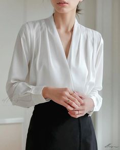 Elluis - Exquisite Ivory Silk Blouse: Refined Design, Long Sleeves, and Opulent Satin Sheen Elegant White V-neck Blouse, Elegant Cream Office Tops, Cream V-neck Blouse For Work, Elegant White Tops For Workwear, Elegant White Tops For Office, Elegant White Tops For Work, Elegant White Office Tops, Elegant Cream V-neck Blouse, Cream V-neck Blouse For Formal Occasions