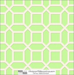 a green and white wallpaper pattern with squares