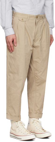 Tapered cotton twill trousers. · Belt loops · Four-pocket styling · Zip-fly · Pleats and button tab at front Supplier color: Khaki