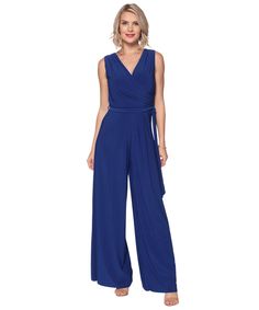 Jumpsuits are oh, so chic! Especially our Last Tango pantsuit jumper! This jumpsuit has a beautiful draped neckline with flowy pant legs, and of course the tie waist. The flowy pant legs make this jumpsuit extra chic. You can wear this to weddings, to parties, or other special occasions. Not to mention, this is one of our best selling pieces! DETAILS: Crossover Neckline, Tie Waistband, Sleeveless, Wide Leg Pant, Jumpsuit FIT: Relaxed, Flowy Fit SIZING: XS-S-M-L-XL FABRIC: 92% Polyester 8% Spande Elegant Wide Leg Belted Jumpsuits And Rompers, Chic Wide Leg Jumpsuit With Tie Waist, Chic Wide Leg Jumpsuits And Rompers With Tie Waist, Elegant Workwear Maxi Jumpsuits And Rompers, Elegant Maxi Length Workwear Jumpsuits And Rompers, Elegant Sleeveless Tie Waist Jumpsuits And Rompers, Elegant Jumpsuits And Rompers With Tie Waist, Chic Blue Wide-leg Jumpsuits And Rompers, Chic Blue Wide Leg Jumpsuits And Rompers