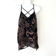 New With Tags Single Los Angles Lottie Tank Top. Black Sleeveless Blouse With Beautiful Bronze/Copper/Gold Tone Embroidery. Deep V-Neck With Sexy Criss Cross X Straps. Adjustable Shoulder Straps. Solid Black Back. Racerback. Semi Sheer. Lined. Hi Low Hem. Relaxed Fit. Purchased At A Boutique Store. Holiday, Unique, Metallic, Flirty, Feminine, Floral, Edgy, Dressy Tank, Cami, Shell, Camisole, Special Occasion, Party, Date Night, Night Out, Gift, High Low Hem, Low Cut, Strappy. Nwt (Possible Stitc Black Sleeveless Summer Top, Black Sleeveless Tops For Vacation, Black Halter Neck Blouse For Summer, Black Summer Blouse For Beach, Black Spaghetti Strap Summer Tops, Black Cami Tank Top For The Beach, Black Summer Tank Top, Sleeveless Black Summer Blouse, Black Sleeveless Summer Blouse