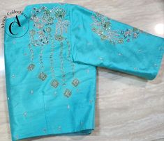 Material: Pure Raw Silk.
Blouse Size: Can be customized as per your size.
Color customization is available. 
For more details contact us on support@akruticollections.com or WhatsApp +91 9052550550
Price may vary depending on the fabric selection. Elegant Embroidered Top With Traditional Drape, High Neck Work Blouse Designs, Elegant Embroidered Top For Designer Festivals, Traditional Elegant Top With Intricate Embroidery, Elegant Embroidered Top With Zari Work And Traditional Drape, Wedding Tops With Intricate Embroidery And Traditional Drape, Elegant Fitted Embroidered Top With Traditional Drape, Fitted Embroidered Top With Traditional Drape, Elegant Embroidered Top For Reception