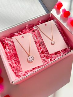 This set of necklaces makes for a perfect gift for your daughter- it's sure to bring a smile to your face and your daughter's too!. It includes two "Happy face" necklaces and comes with a lovely note, as shown in the picture. The necklaces are already packaged in a beautiful pink 5x7 inch box, ready to be gifted. At checkout, you can select the "this is a gift" option if you prefer not to display the invoice. PRODUCT DETAIL Necklace length: 15.5"with 16.5" and 17.5"Extender Gold dipped Hypoaller Hypoallergenic Necklaces For Birthday And Valentine's Day, Playful Smiley Face Jewelry For Gifts, Playful Personalized Jewelry For Gift, Playful Personalized Jewelry As A Gift, Pink Jewelry For Mother's Day And Best Friend Gift, Pink Jewelry For Best Friend Gift On Mother's Day, Hypoallergenic Necklace Gift For Mother's Day, Hypoallergenic Necklace For Mother's Day Gift, Playful Personalized Necklaces For Gifts