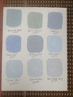 some blue and white paint samples on a piece of paper