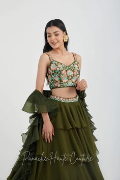 Mehendi Color Tiered Skirt with Crop Top – Panache Haute Couture Elegant Green Sharara With Ruffles, Elegant Green Ruffled Sharara, Georgette Sharara With Tiered Skirt For Receptions, Georgette Tiered Skirt Sharara For Reception, Green Georgette Set With Ruffles, Silk Choli With Ruffles For Reception, Elegant Green Long Skirt Sets, Tiered Ruffle Georgette Lehenga, Festive Ruffled Tiered Lehenga