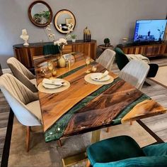 a wooden table with chairs and plates on it