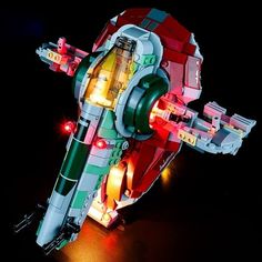 a lego star wars fighter ship with lights on it's front end and side