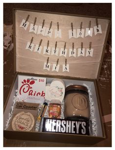 a birthday gift box filled with lots of goodies