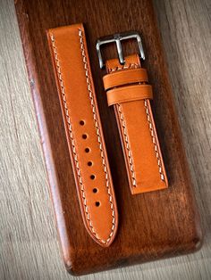 -Tan color genuine leather(optional) -Cream color stitches -22/20 mm width(optional) -Lenght:125x75mm Made to order product... Classic Brown Rectangular Watch Bands, Classic Brown Vegetable Tanned Leather Watch Band, Classic Brown Watch With Wrist Strap, Rectangular Brown Leather Watch Bands, Brown Leather Rectangular Watch Bands, Classic Brown Watch Bands For Everyday Use, Leather Watch Strap, Leather Watch Bands, Watch Straps