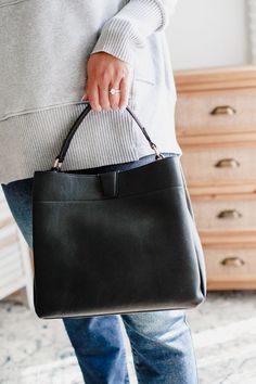 The Tati Satchel is the ultimate hobo bag for the quirky fashionista. Made of 100% vegan leather, this bag features a magnetic snap closure, zip and slip pockets, and an adjustable, detachable shoulder strap for ultimate versatility. With two spacious compartments, you'll have plenty of room for all your essentials. (Vegan leather: faux, but fabulous!) Women's vegan leather satchel with adjustable shoulder strap. Vegan leather Versatile Shoulder Bag With Magnetic Closure For On-the-go, Faux Leather Hobo Bag With Adjustable Strap For On-the-go, On-the-go Tote Satchel With Magnetic Closure, Modern Satchel With Magnetic Closure For On-the-go, Trendy Hobo Bag With Adjustable Strap For On-the-go, Versatile Everyday Hobo Bag With Zipper, Versatile Everyday Hobo Bag With Zipper Closure, Everyday Bucket Bag With Magnetic Closure, Chic Hobo Bag With Detachable Handle For On-the-go