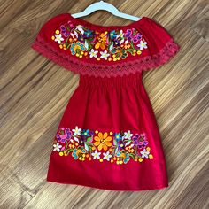 Beautiful Mexican Hand Embroidered Dress Red Sleeveless Dress With Floral Embroidery, Red Sleeveless Embroidered Dress, Red Floral Embroidered Cotton Dress, Red Cotton Dress With Floral Embroidery, Fitted Red Embroidered Cotton Dress, Red Fitted Embroidered Cotton Dress, Red Embroidered Short Sleeve Dress, Short Sleeve Red Dress With Embroidered Hem, Red Short Sleeve Dress With Embroidered Hem