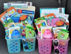 the back seat of a car is filled with toys and other items for children to play in