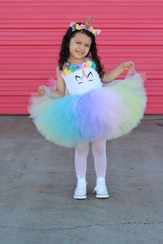 UNICORN tutu dress, tutu dress, unicorn birthday, rainbow tutu dress, pastel tutu, unicorn dress Pease leave the event date in the notes to seller and or message us to make sure your tutu arrives on time. We recommend ordering for events in enough time so that your tutu arrives a week early. Our UNICORN tutu dress is one of our newest designs. Perfect for any event, this dress is made on a crochet top and the front is covered with white velvet fabric. The front has a unicorn face. The skirt is k Unicorn Dresses For Kids, White Velvet Fabric, Rainbow Tutu Dress, Unicorn Tutu Dress, Unicorn Dresses, Unicorn Costume Kids, Crochet Tutu Dress, Feather Tutu, Toy Story Halloween