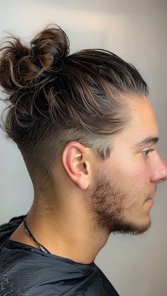 Man Bun Evolution: 22 Styles to Transform Your Appearance Long Hairstyles With Undercut, Man Undercut, Undercut With Long Hair, Hairstyles With Undercut, Modern Long Hairstyles, Undercut For Men, Boys Undercut, Mens Long Hair Undercut, Mens Ponytail Hairstyles