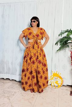 Look elegant in this beautiful African wrap crop top with a skirt. Sleeveless Two-piece Bohemian Dress, Two-piece Flowy Beach Dress, Beach Two-piece Dress With Flowy Skirt, Summer Two-piece Maxi Dress, Two-piece Long Skirt Dress For Vacation, Two-piece Long Skirt Summer Dress, Fitted Two-piece Dress For Vacation, Summer Two-piece Long Skirt Dress, Chic Cropped Beach Dress