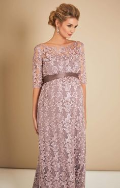 Made from beautiful vintage-inspired sheer lace, the Asha in Lilac is a stunning floor-length gown. From Baby Shower to Bridesmaid, with a stylish boat neckline, sheer ¾ length sleeves and dramatic full skirt that drapes over your bump, you’ll look and feel amazing at the most special of occasions. •Premium embroidered tulle in lilac •Floor length gown with ¾ sleeves •Empire waist with gentle gather over the bump •Sheer neckline and sleeves •Fully lined with premium jersey •Add a sash to define Lace Maternity Dress With Lace Bodice For Wedding, Maternity Wedding Dress With Lace Bodice, Wedding Maternity Dress With Lace Bodice, Elegant Maternity Wedding Dress With Lace Trim, Elegant Lace Maternity Wedding Dress, Elegant Wedding Maternity Dress With Lace Trim, Lace Maternity Wedding Dress With Scalloped Lace, Elegant Maternity Dresses With Delicate Lace, Elegant Maternity Dress With Lace Bodice