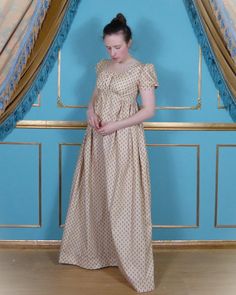 Cream cotton regency day dress, made from 100% cotton in a cream floral fabric. Fastened at the back with 4 buttons and lined on the inside with cotton.   Will fit Bust: 31"-36" Waist: 24"-29" Under bust: 26"-29" Waist to Floor: 42" The item is ready to ship and will take 2-5 to be dispatched. We are an English based company If you are UK(England) Based you can expect the order on average 2-3 days after the day it has shipped Across seas post takes longer so please keep this in mind when orderin Victorian Cotton Dress With Historical Design, Historical Design Fitted Cotton Dress, Regency Style Dress With Empire Waist And Historical Design, Regency Style Empire Waist Dress With Historical Design, Cotton Victorian Dress For Dressmaking, Fitted Cotton Prairie Dress With Empire Waist, Beige Cotton Prairie Dress For Daywear, Historical Cotton Prairie Dress For Daywear, Cotton Regency Prairie Dress With Empire Waist