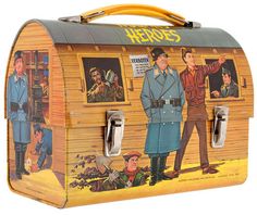 an old fashioned lunch box with the image of men in uniform painted on it's side