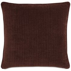 a brown pillow on a white background