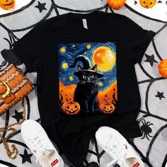 ✪ "Scary Night Cat" Van Gogh Halloween ✪ Celebrate Halloween with a twist of art and spookiness with our "Scary Night Cat" Van Gogh Halloween shirt. It's the purr-fect choice for cat lovers who adore Halloween. * "Scary Night Cat" Van Gogh-inspired Halloween shirt featuring a whimsical cat with a witch hat and mummy wrappings. * Made from comfortable, high-quality fabric perfect for Halloween enthusiasts. * Available in various sizes to suit cat lovers celebrating Halloween. * Please double chec Spooky Black T-shirt With Cat Print, Halloween Black T-shirt With Cat Design, Black Halloween T-shirt With Cat Design, Spooky Halloween T-shirt With Cat Design, Black Witchy Halloween T-shirt, Spooky Black T-shirt With Cat Design, Spooky Halloween Cat Design Top, Van Gogh Halloween, Funny Black Cats