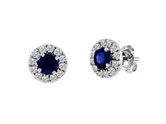 Sapphire and Diamond Halo Earring in 14k White Gold. The round sapphire in these earrings have a total carat weight of 0.60 carats. The diamonds have a total carat weight of 0.33 carats. Gia Certified Sapphire Earrings For Formal Occasions, Gia Certified Sapphire Diamond Earrings For Formal Occasions, Formal Round Diamond Earrings With Gemstones, Formal Gia Certified Sapphire Diamond Earrings, Round Sapphire Earrings For Formal Occasions, Formal Round Sapphire Earrings, Blue Round Cluster Earrings For Formal Occasions, Fine Jewelry Sapphire Round Cut Earrings, Formal Round Sapphire Diamond Earrings