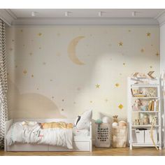 a child's bedroom with stars and moon wallpaper