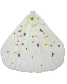 a white lamp shade with green and purple designs on it's sides, hanging from the ceiling