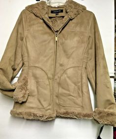 * Retail $200.00 * Brand new with Tags * Feels and look like a suede but it is Polyester Face & Back Faux Fur  * Runs True to size * Dry Clean ONLY * Fast and Free shipping Winter Suede Outerwear With Faux Fur Trim, Winter Suede Outerwear With Faux Fur Lining, Fall Beige Suede Outerwear, Beige Suede Outerwear For Fall, Suede Outerwear With Faux Fur Lining And Long Sleeves, Long-sleeved Suede Outerwear With Faux Fur Lining, Winter Suede Leather Jacket With Long Sleeves, Winter Suede Outerwear With Zipper Closure, Beige Jacket