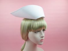 Traditional Nurse Hat - Cotton, Starched, Pre-formed - Solid white - The very front face is 3-3/4 inches from top to bottom. - The top edge is 16 inches long. - Hat can be worn erected with button (included) or worn flat secured with bobby pins (also included). Due to the chance that it being in a medical environment, returns and exchanges are strictly not allowed on this item. Thank you for looking/buying. Please see all pictures and ask questions. Have a blessed day. Nursing Pins, Becoming A Nurse, Hem Stitch, Nurse Hat, Nursing Cap, Nursing Career, Baby Top, Vintage Traditional, La Face