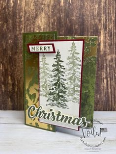 a christmas card made with stampin's evergreens and pine trees from the merry collection