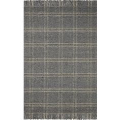 a gray and black plaid rug with fringes