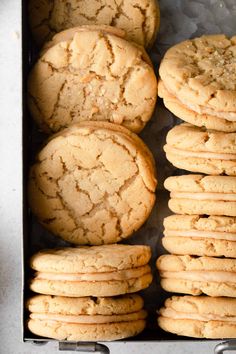 several cookies in a metal container on a table