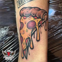 a piece of pizza with the words relax on it is shown in this tattoo design