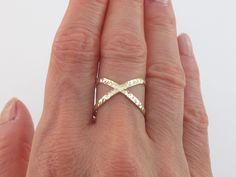 Fabulous 14k Solid Yellow Gold CrissCross Ring!! Material: Real 14k gold, Stamped on the inside of the ring Weight: Average 1.5 grams Available sizes: 7 and 8 Finish: Diamond cut all the way around Gift box included Images may be enlarged to show detail and the item may look larger than it appears in person. In order to reduce buyer remorse and return please pay attention to the photos and read description to make sure about measurements such as size , thickness, and length before the purchase. Hammered Gold Diamond Ring For Gifts, Gold Hammered Stackable Rings For Promise, Gold Hammered Promise Ring, Hammered Gold Jewelry For Promise, Gold Hammered Jewelry For Promise, Gold Hammered Stackable Rings For Anniversary, Anniversary Gold Hammered Diamond Ring, Gold Stackable Rings With Diamond Cut Open Band, Gold Diamond Cut Sterling Silver Rings