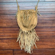 "60-70's era hand made purse with seed beaded patch Condition is great please see images to help answer any questions you might have. strap -length 20\" bag -length 10\" -width 8\"" Traditional Fringe Shoulder Bag For Everyday Use, Bohemian Bags With Beaded Fringe For Everyday Use, Traditional Fringe Bag For Everyday Use, Festival Pouch Shoulder Bag With Tassels, Vintage Everyday Bags With Tassels, Traditional Rectangular Fringe Shoulder Bag, Bohemian Brown Bag With Beaded Fringe, Festival Fringe Shoulder Bag, Brown Bohemian Satchel With Fringe