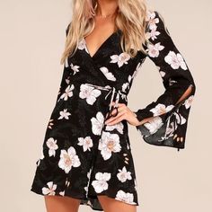 Lulus Bette Black Floral Print Long Sleeve Wrap Dress Size: Small Color: Black Original Price: $57 Brand New With Tags Flirty Black Dress For Spring, Black Flirty Dress For Spring, Printed Black Mini Dress For Night Out, Black Printed Dress For Date Night, Black Dresses For Spring Brunch, Black Printed Mini Dress For Fall, Black Printed Mini Dress For Day Out, Black Long Sleeve Mini Dress With Floral Print, Spring Black Dresses For Brunch