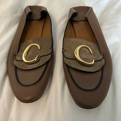 Worn A Handful To Times. These Chloe Loafers Easily Convert To A Mule. Size 39, I Think They Are Pretty True To Size. Color Is Taupe. Chloe Loafers, Leather Mushroom, Heel Loafers, Chloe Brown, Gold C, Taupe Leather, Chloe Shoes, C Logo, Chanel Espadrille