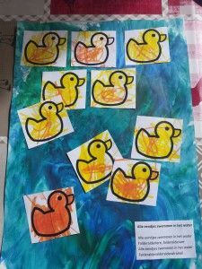 an art project with rubber ducks on it