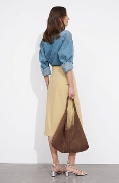 An adjustable D-ring belt and cargo pocket add utilitarian elements to a nonstretch midi skirt finished with an asymmetric hem for contemporary appeal. Attached belt Cargo flap-patch pocket 55% hemp, 45% cotton Dry clean or machine wash, line dry Imported D Ring Belt, Asymmetric Hem, Patch Pocket, Midi Skirt, Nordstrom, Clothes