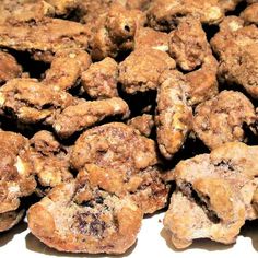 a pile of chocolate chip cookies sitting on top of a table