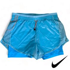 New Nike Women's Icon Clash Tempo Luxe Mid-Rise Running Shorts Blue Size Xs New Without Tags Nike Women's Icon Clash Tempo Luxe Mid-Rise Running Shorts Blue Size Medium. Mid-Rise Waistband With Adjustable Bungee Drawcord Body-Hugging Undershort With Extended Length For Smooth, Comfortable Feel Pocket Along Back Of Undershort Drop-In Storage Pocket Solo Swoosh Logo On Left Leg Inventory Bin 21 Swoosh Logo, Iconic Women, Shorts Athletic, Nike Shorts, New Nike, Running Shorts, Athletic Shorts, Nike Women, Mid Rise