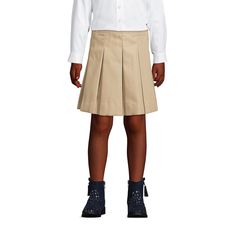 Classic pleats in our easy-care blend fabric that resists stains, wrinkles and fading so she looks good all school day long. Top-of-knee length. White Skirt For School In Fall, Solid Cotton School Skirt, Preppy School Skirt For Fall, Preppy Skirt For School In Fall, Preppy Fall School Skirt, Fitted School Uniform Skirt, Classic Pleated Skort For School, Classic Fitted School Skort, Classic Fitted Skort For School