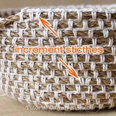 the instructions for how to make a basket with twine stitchs on top and two orange arrows pointing towards each other