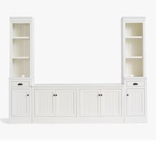 a white entertainment center with shelves and drawers